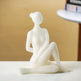 White Marble-Finish Sitting Woman Figurine